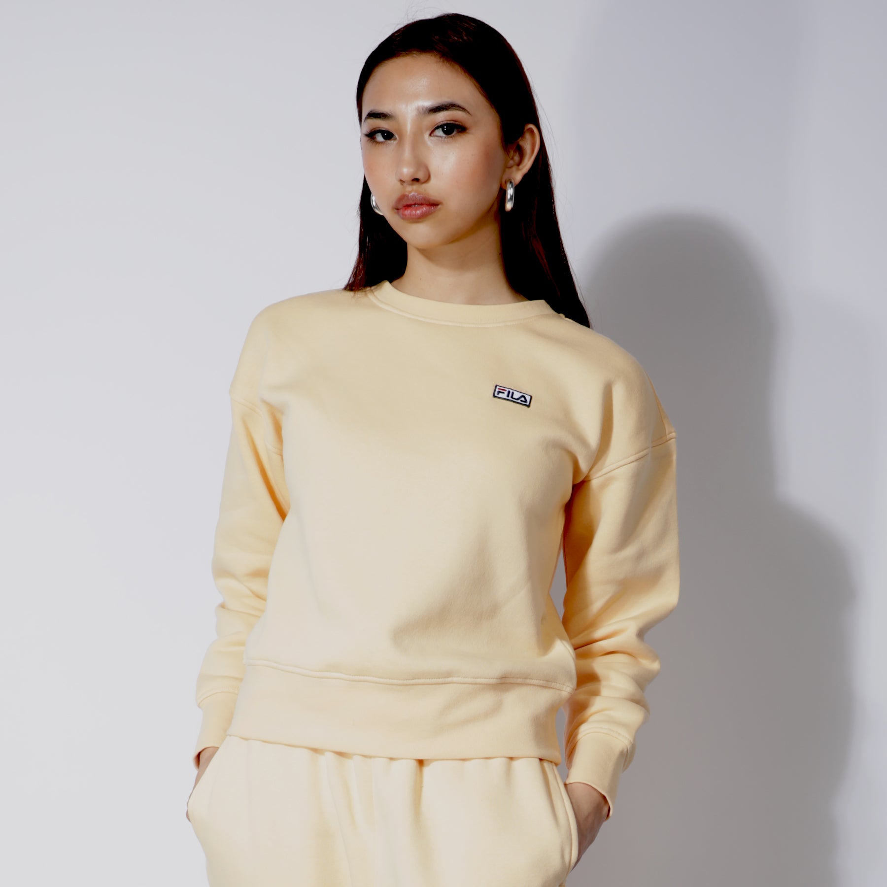 Yellow fila sweater hot sale