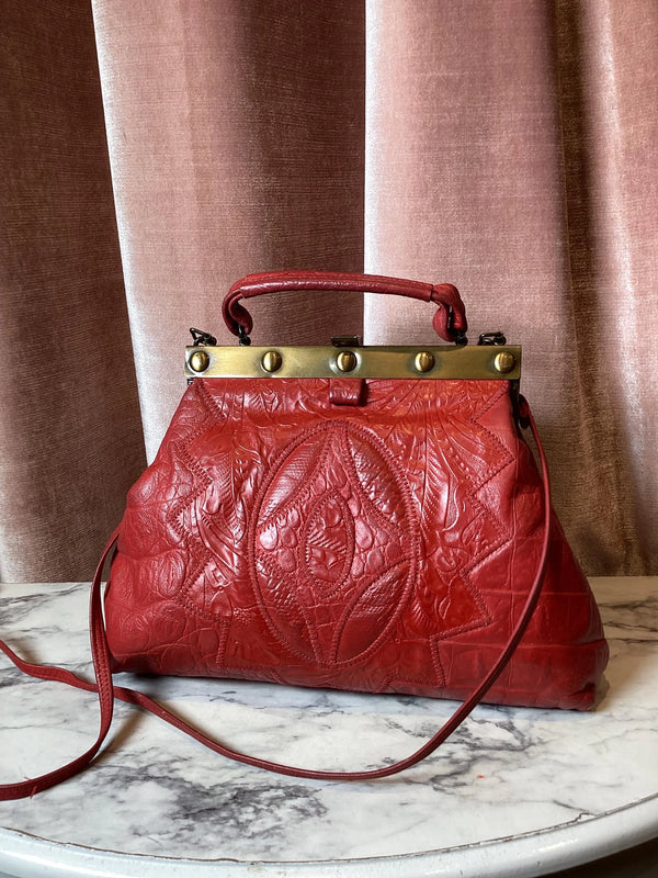 Vintage 1980s leather Embossed Brass Frame Top handle crossbody bag