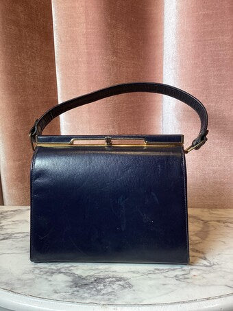 Vintage 1950’s leather framed top handle hand bag